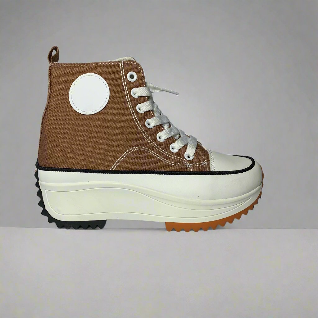 High-Top sneaker with a Brown canvas upper, The shoe Features a chunky white sole with a brown rubber sole.